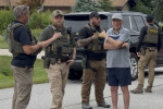 Michael Callahan with ICE officers